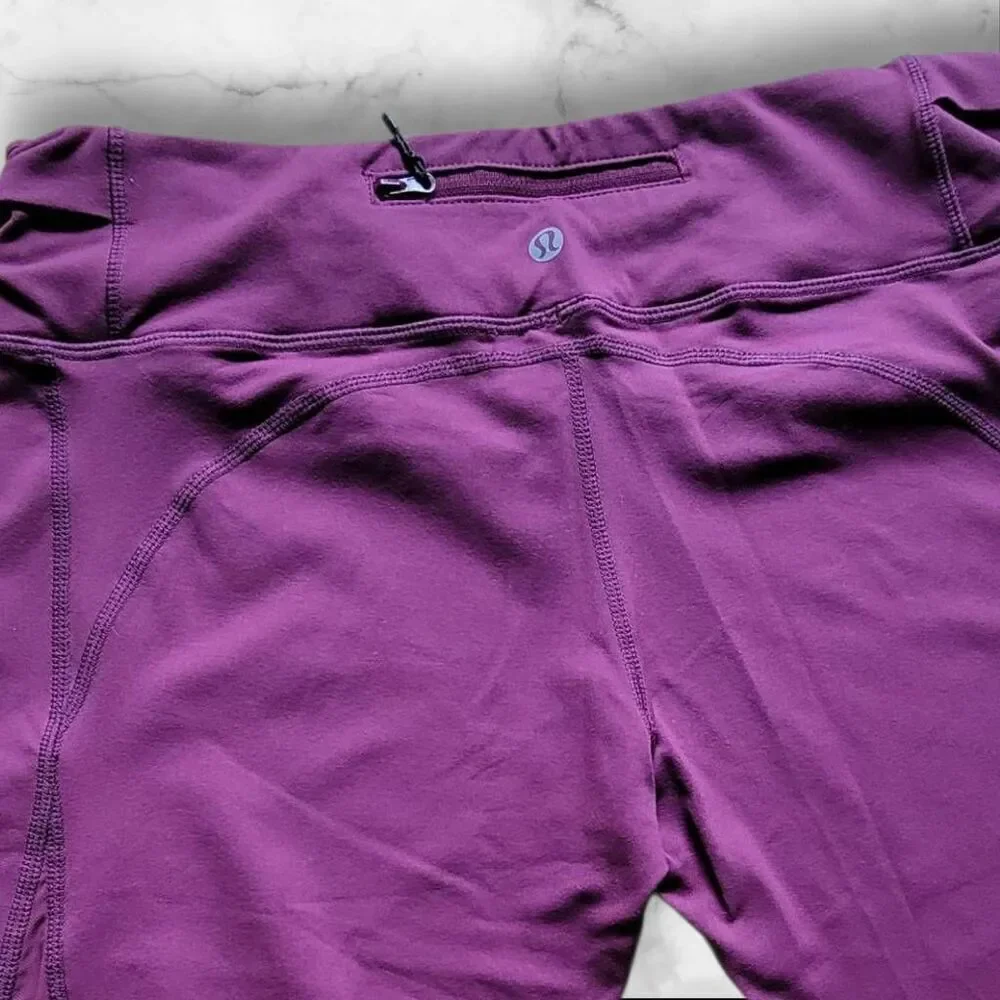 Lululemon Size 12 Purple Mesh Reflective Leggings